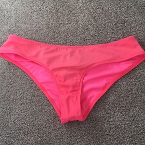 Bright coral swim bottoms